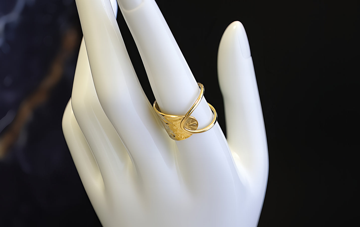 ANELLO A MEZZA FASCIA ASIMMETRICA