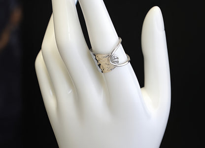 ANELLO A MEZZA FASCIA ASIMMETRICA
