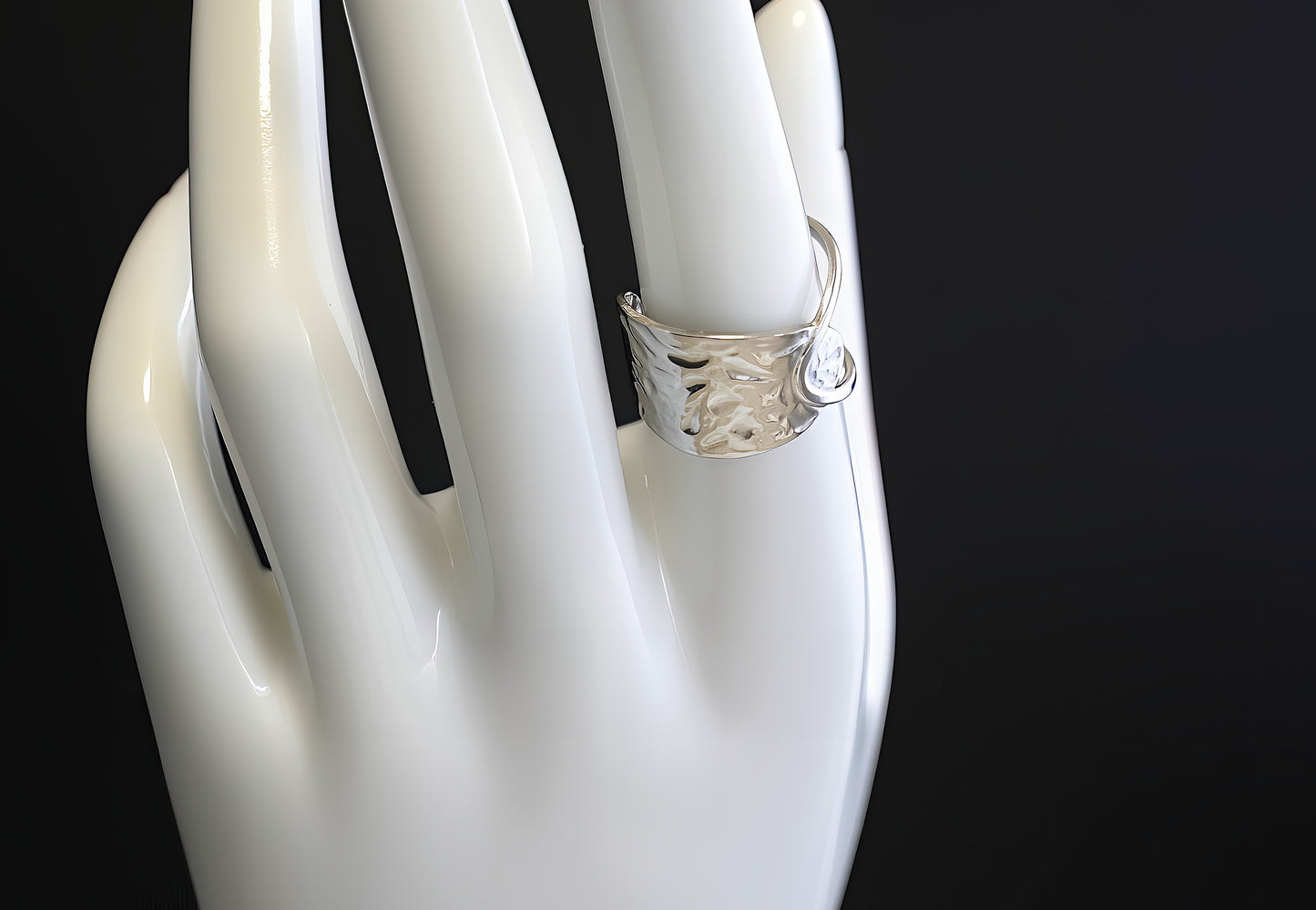ANELLO A MEZZA FASCIA ASIMMETRICA