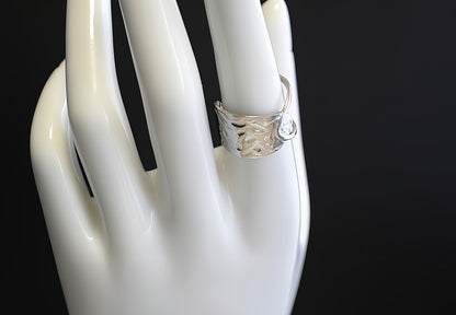 ANELLO A MEZZA FASCIA ASIMMETRICA