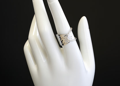 ANELLO A MEZZA FASCIA ASIMMETRICA