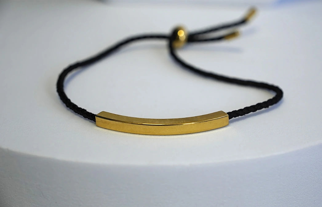 BRACCIALE IN CORDA CON PLACCHETTA PERSONALIZZABILE