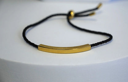 BRACCIALE IN CORDA CON PLACCHETTA PERSONALIZZABILE