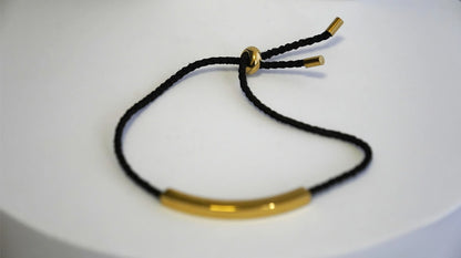 BRACCIALE IN CORDA CON PLACCHETTA PERSONALIZZABILE